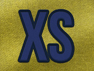 maat XS als geweven tekst op gele textiel